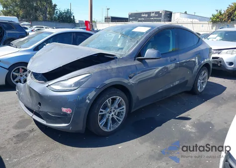 2023 Tesla Model Y z USA, uszkodzony, nr VIN 7SAYGDEE5PF865572